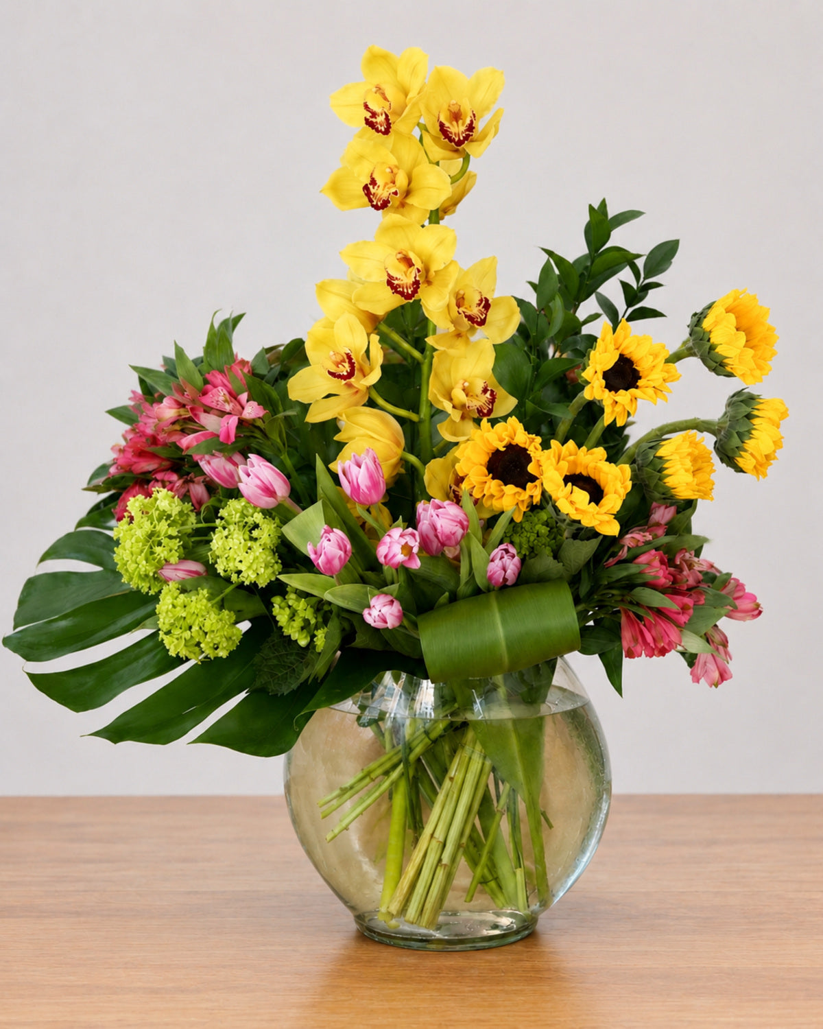 Golden Tropics floral arrangement by Pardes Floral