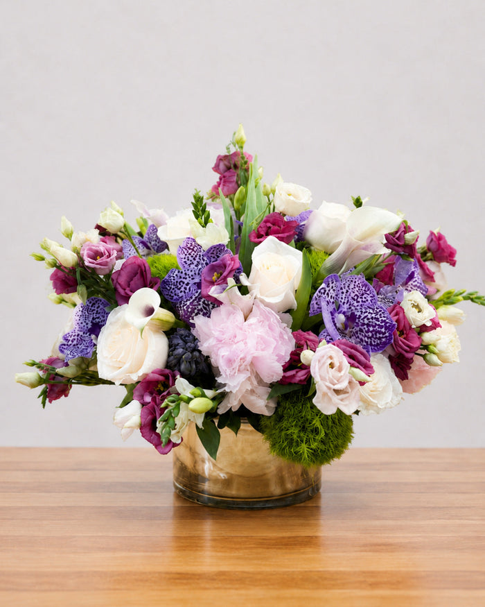 Orchid Amour floral arrangement by Pardes Floral