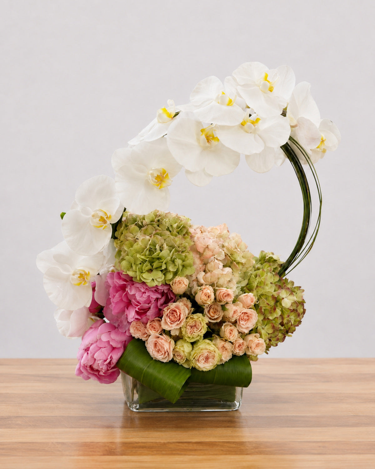 Orchid Arc floral arrangement by Pardes Floral