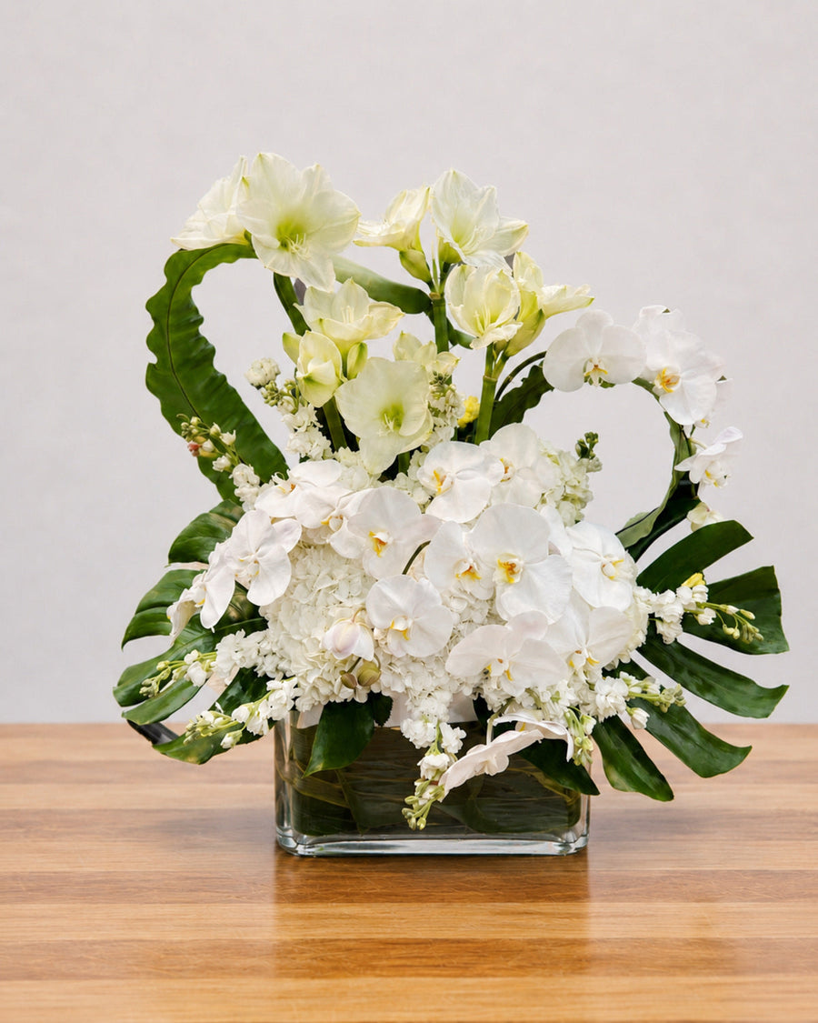 Orchid Blanc floral arrangement by Pardes Floral