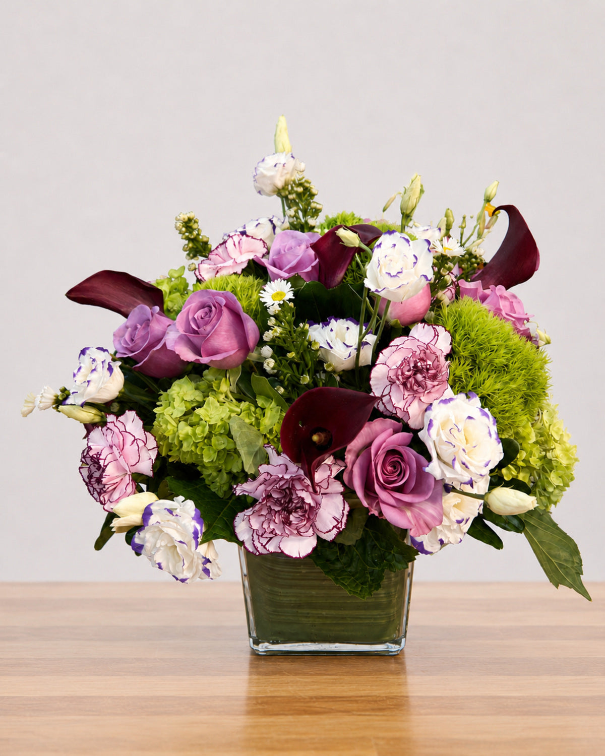 Plum Couture floral arrangement by Pardes Floral