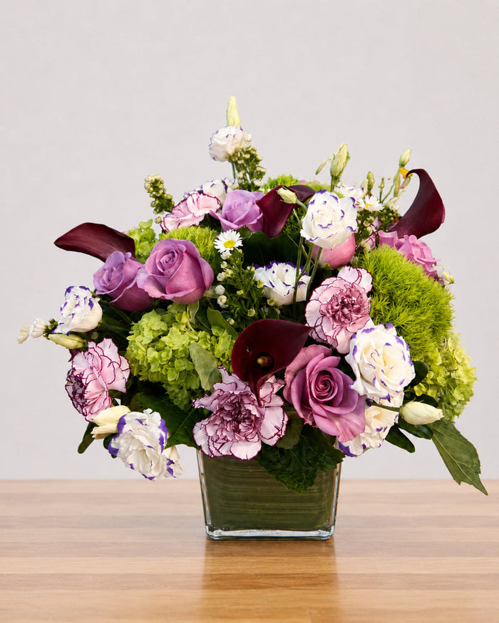 Plum Couture floral arrangement by Pardes Floral