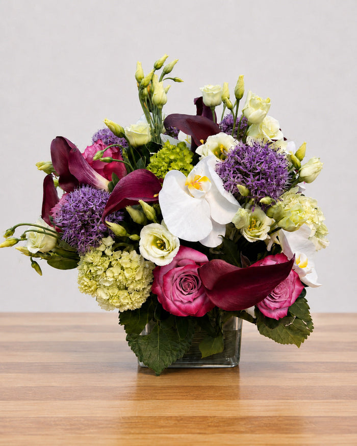 Royal Amethyst floral arrangement by Pardes Floral