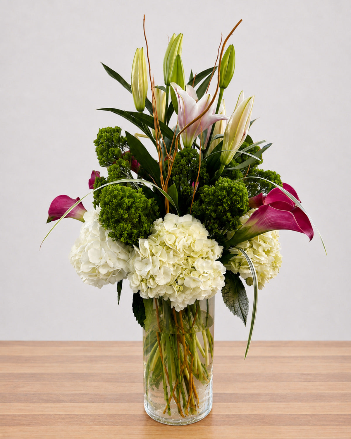 Verdant Lily floral arrangement by Pardes Floral